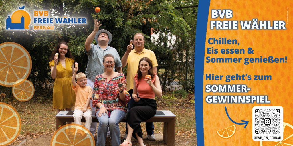 Mitstreiter von BVB / FREIE WÄHLER in sommerlicher Kleidung mit Orangen