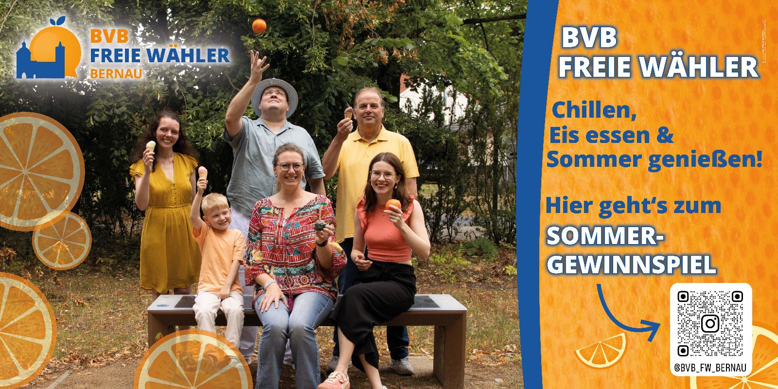 Mitstreiter von BVB / FREIE WÄHLER in sommerlicher Kleidung mit Orangen